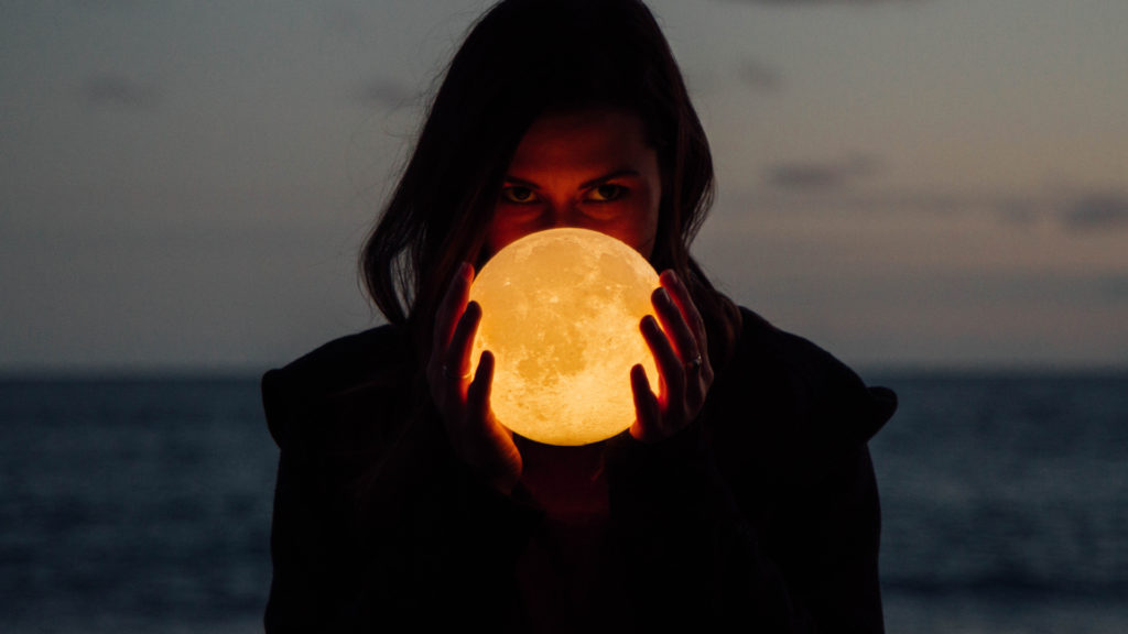 woman holding moon