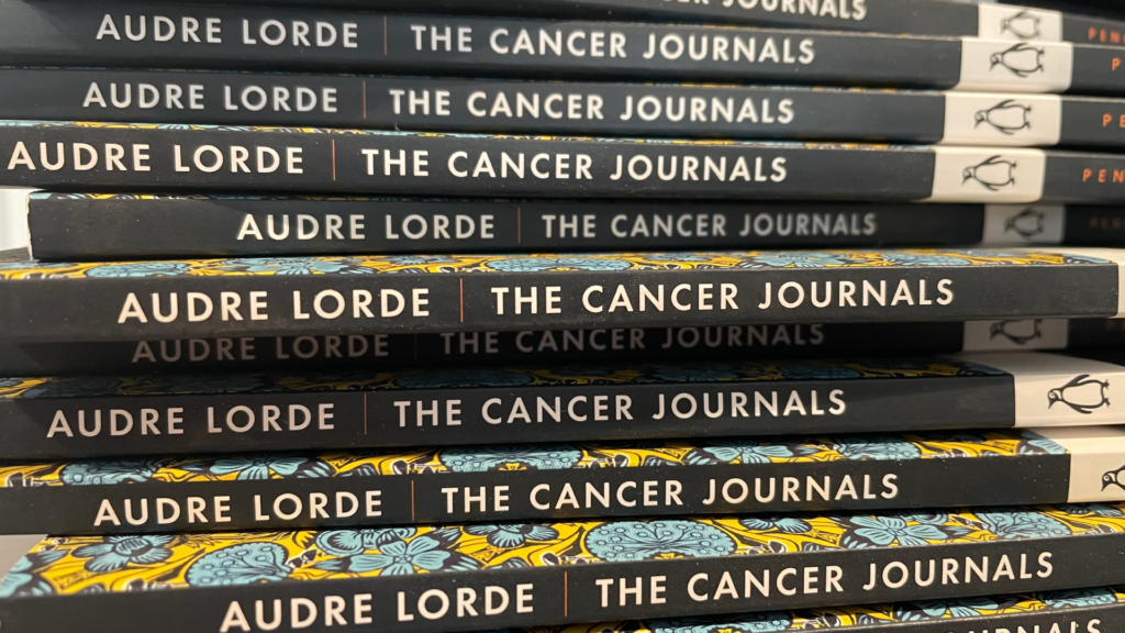 the cancer journals stacked